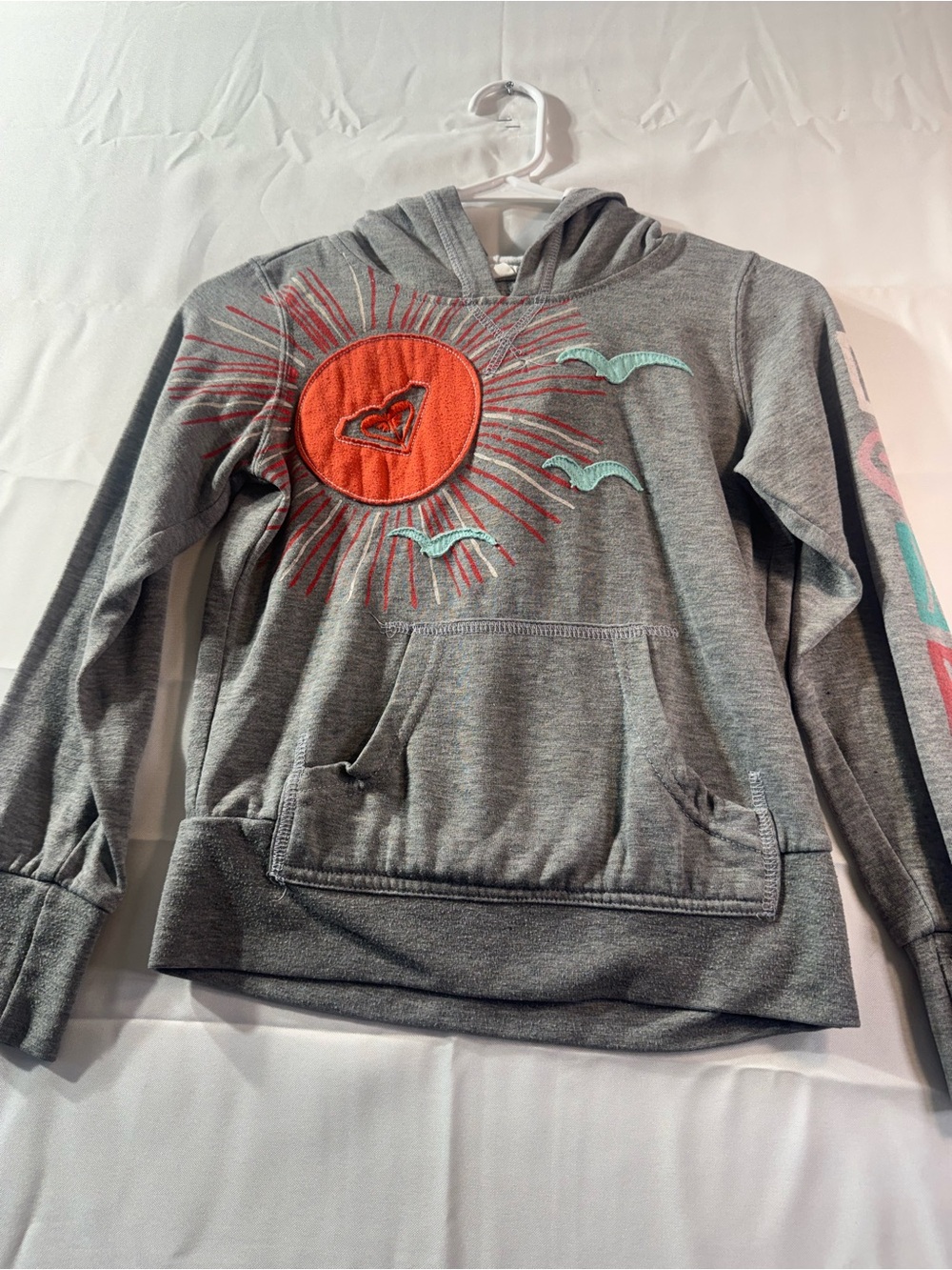 Roxy Medium Gray Hoodie with Orange Sun and Teal Accents